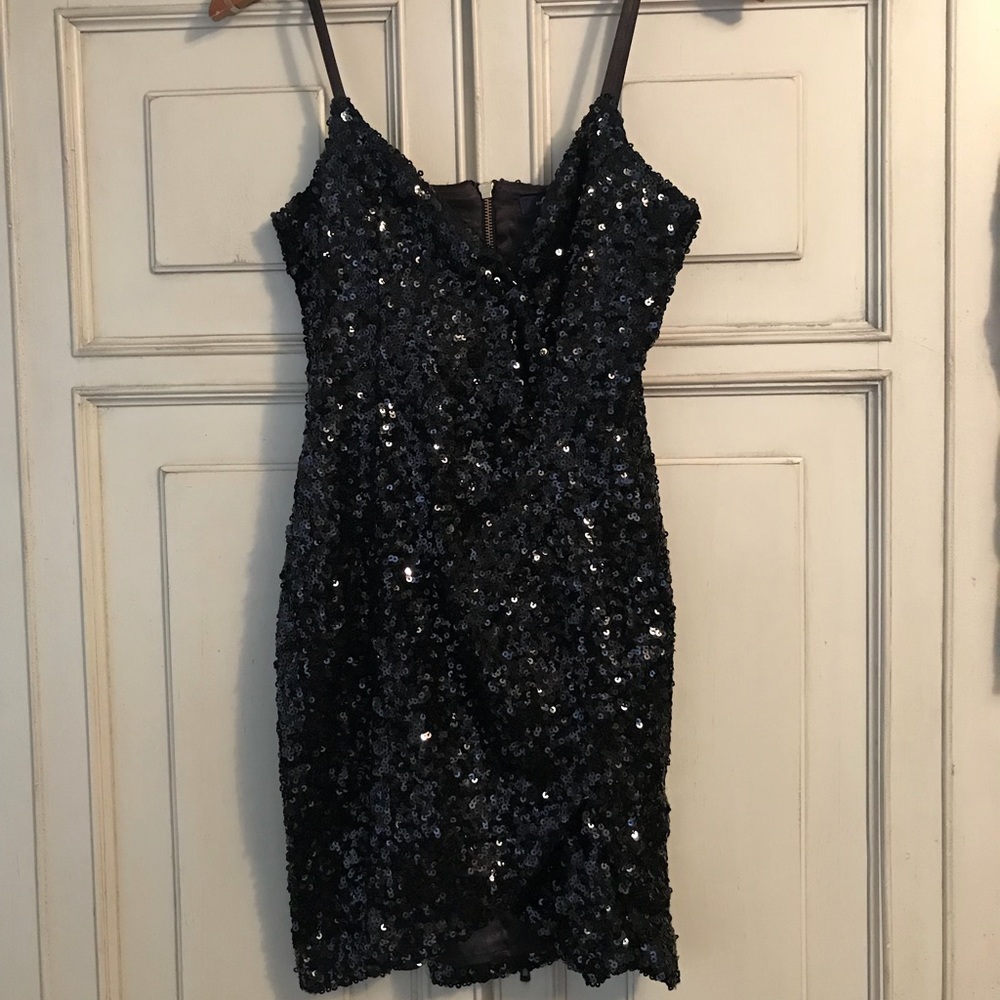 Black Sequin Dress with small front slit.